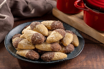 Shortbread biscuit covered with chocolate and crystallized sugar. In Brazil known as (Monteiro Lopes)
