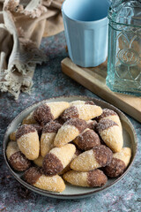 Shortbread biscuit covered with chocolate and crystallized sugar. In Brazil known as (Monteiro...