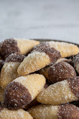 Shortbread biscuit covered with chocolate and crystallized sugar. In Brazil known as (Monteiro Lopes)
