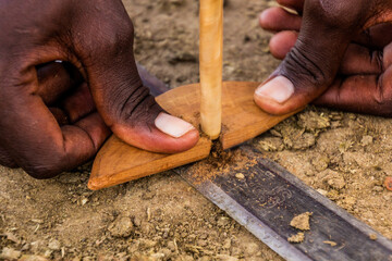 Detail of Masai man making a fire, Kenya