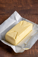 Fresh butter from the farm on the table. Butter tablet.