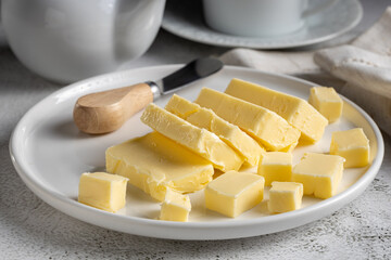 Fresh butter from the farm on the table. Butter tablet.