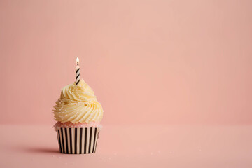 Birthday cupcake with a candle on a light pink background, generative AI