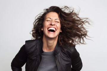 Lifestyle portrait photography of a pleased woman in her 40s that is placed against a white background . Generative AI