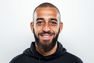 Obraz premium Portrait of a handsome young man with a beard on a white background