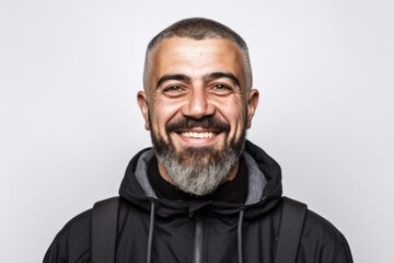 Fototapeta premium Handsome man with beard and mustache smiling on a white background