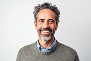 Obraz premium Medium shot portrait photography of a satisfied man in his 40s that is wearing a chic cardigan against a white background . Generative AI