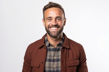 Portrait of a handsome man smiling and looking at camera isolated on a white background