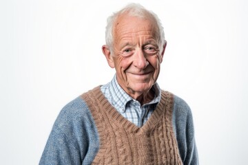 Portrait of a happy senior man looking at camera over white background
