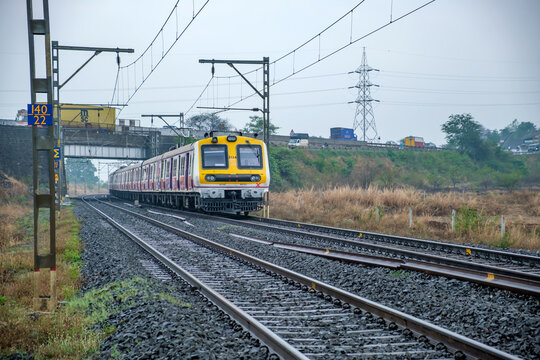 Pune, India - March 05 2023: A local commuter train on the Pune to Lonavala route, at Kamshet near Pune India.