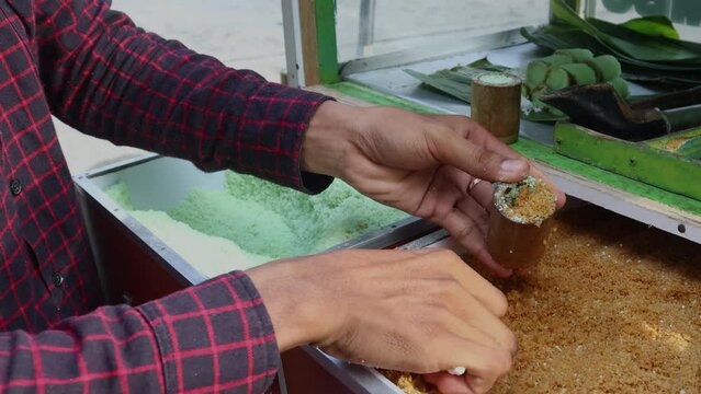 video of the process of making putu cake, a traditional Indonesian food