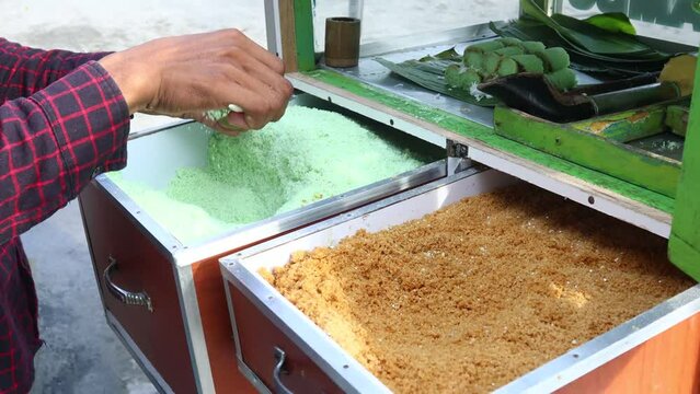 video of the process of making putu cake, a traditional Indonesian food