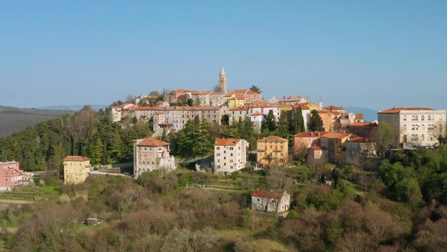 Rising aerial of Croatian town of Labin, surrounding landscape and sea