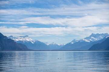 Fototapeta na wymiar Mountain and Water Background View. Lake Geneva Vevey, Swistzerland.