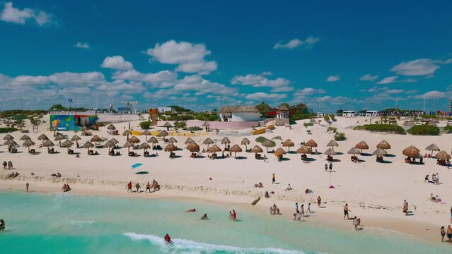 revealing shot of Cancun beach in the hotel zone in the summer and sunny day