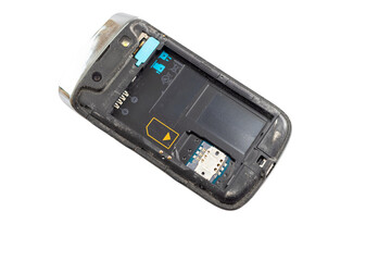 The back side of a smart phone with removable battery open