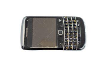 Old and used black phone with keypad