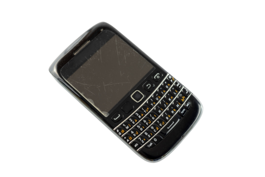 Old fashioned black mobile phone with physical buttons keypad