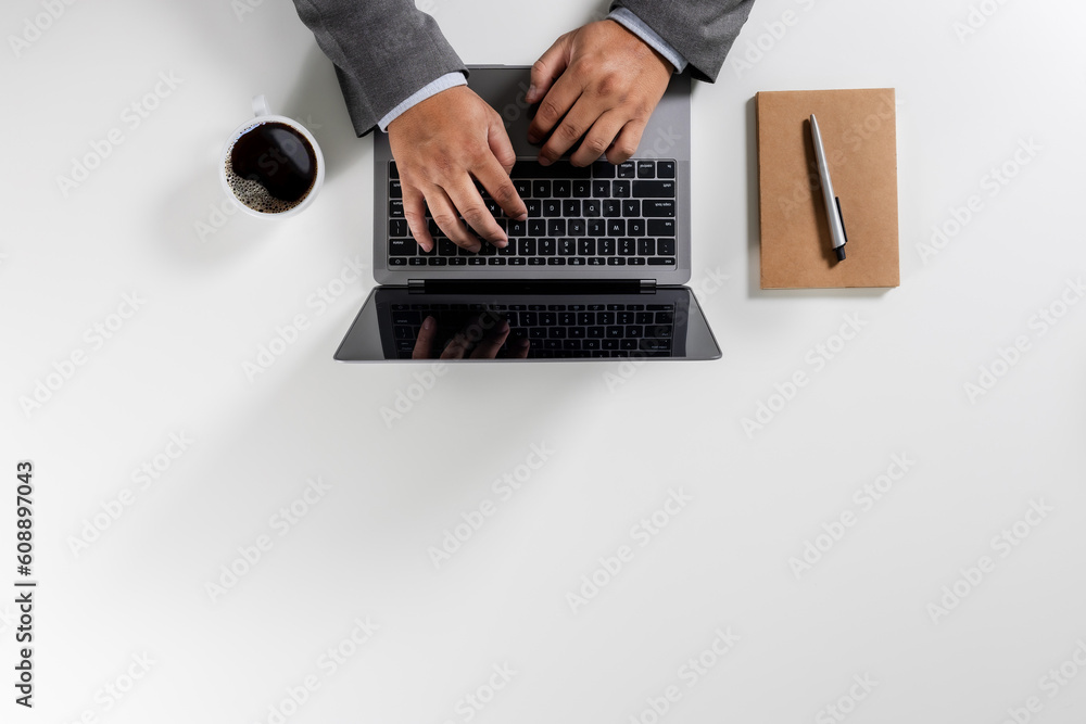 Poster person happy using a computer notebook top view overhead copy workspace workplace planning top idea