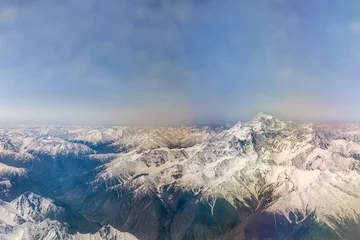 Photo sur Plexiglas Nanga Parbat Majestic heights unveiled: A captivating aerial view from a commercial aircraft reveals the grandeur of Nanga Parbat, the legendary 'Killer Mountain,' standing tall and mighty in all its glory.