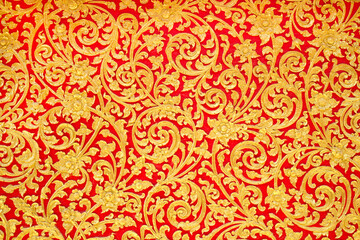 Thai traditional golden flower or kanok pattern design wall for temple.