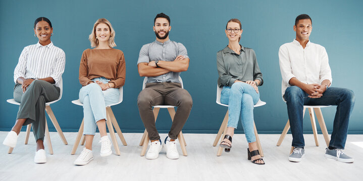 Group, business people and chair portrait by wall with smile, diversity and waiting room for hr recruitment. Men, women and smile together for interview, human resources and hiring for job at startup