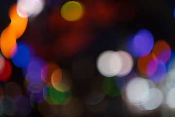 Abstract, defocused background with ___ and ___ lights.
