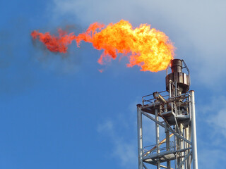 Gas or flare burn on offshore platform. Offshore construction platform