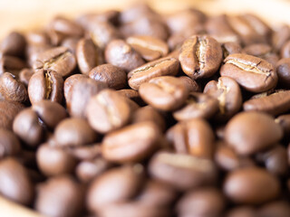 brown arabica coffee bean roast level medium taste delicate lively bright seed caffeine espresso drink food cafe beverage Chiang Rai, Thailand coffee on wooden table background top view selected focus
