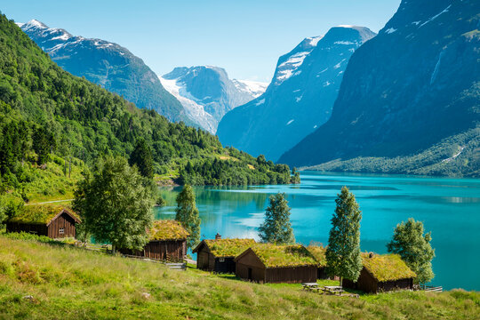 Panorama of norwegian landscape with traditional farm village