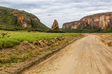 Track in the Hell's Gate National Park, Kenya. The Fisher's Tower visible.