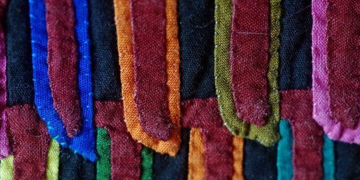 Closeup of handmade Guna mola (appliqu&eacute;, trapunto)  textile pattern made by indigenous tribal people of Panama and Colombia