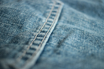 Jeans background, denim with seam of fashion design