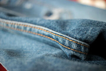Jeans background, denim with seam of fashion design