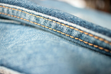 Jeans background, denim with seam of fashion design