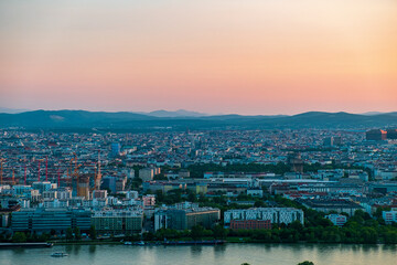 Vienna at sunset. The view over Vienna at dusk. View over Austrian city before evening. Before evening in  Vienna