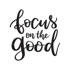 Focus in the good, hand drawn lettering phrase. Motivational quote typography.