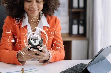 Person typing smartphone and tablet with SDK icon on virtual screen. SDK Software development kit programming language technology concept in office.