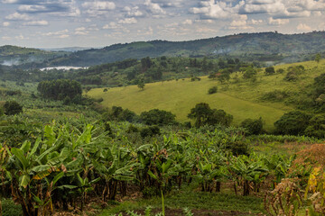 Fototapeta na wymiar Lush rural landscape with Nyabikere lake near Fort Portal, Uganda