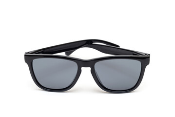 Black modern sunglasses on a white background