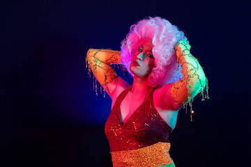 portrait of a drag queen on black background