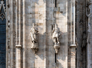 Marble sculptures and other decorations in the back side of the Milan Cathedral, Lombardy region, Italy