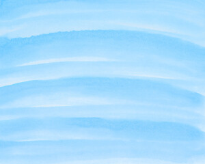 Obraz premium Abstract blue watercolor background. The color splashing on the paper. Hand drawn.