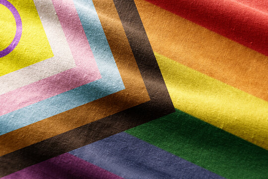 Fabric with the colors of the progress LGBT flag