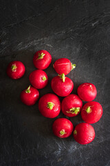 Radishes on a slate background