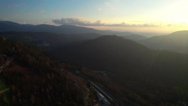 Mountain landscape in Semmering, Austria, aerial drone view at golden hour