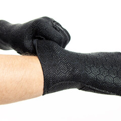 Man in black driving gloves on white background. Square. Neoprene gloves. Anti-slip coating