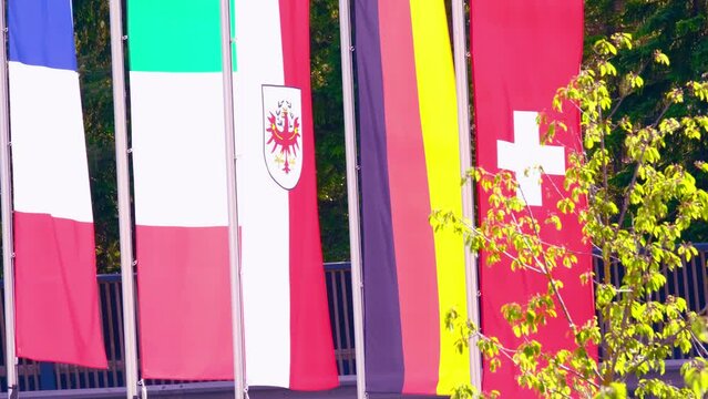 silk national flag European state of Germany, Austria, Switzerland, Italy flutters in wind, concept tourism, economy, politics, independence day, rights and freedoms of citizens, fair elections