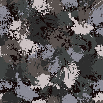 Seamless gray camouflage pattern with paint splatter, stains, blots, smudge of paint. Good for apparel, fabric, textile, surface design. For prints, clothing, t shirt, surface design. Vintage style