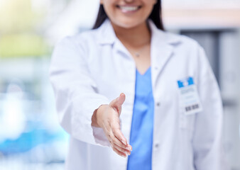 Doctor, open hand shake and woman with welcome, respect or greeting in hospital, hiring and smile. Female medic, handshake and kindness for partnership, recruitment or agreement in clinic office - obrazy, fototapety, plakaty